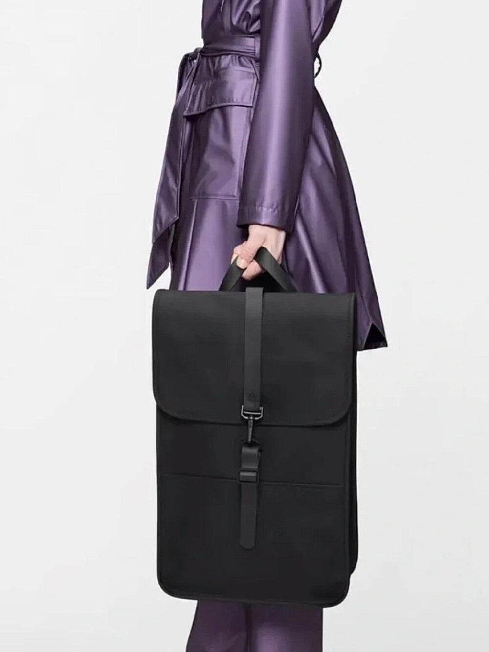 Rains Waterproof Laptop Backpack with a small T Brand (NYT) logo UNISEX